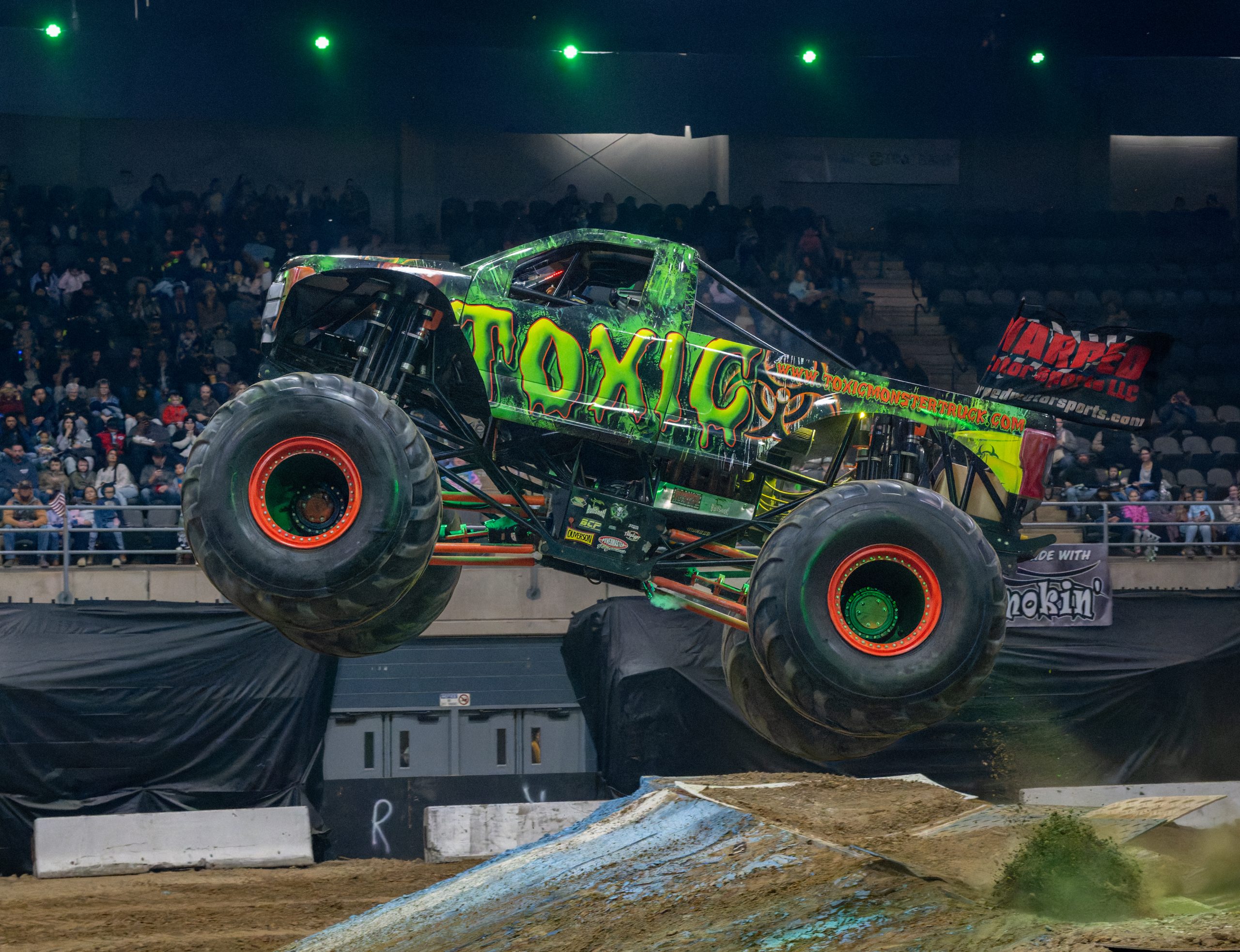 Toxic Monster Truck performing a jump during the freestyle competition